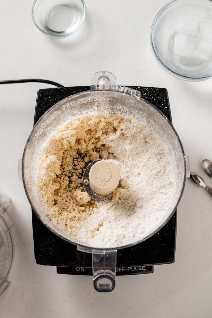 Overhead shot of step three in making the pie dough for Banana Cream Pie.