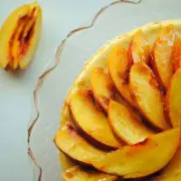 Godiva Vanilla Bean White Chocolate Cheesecake with Peach Topping
