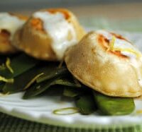 Homemade Crab and Goat Cheese Ravioli with Spicy Snow Peas