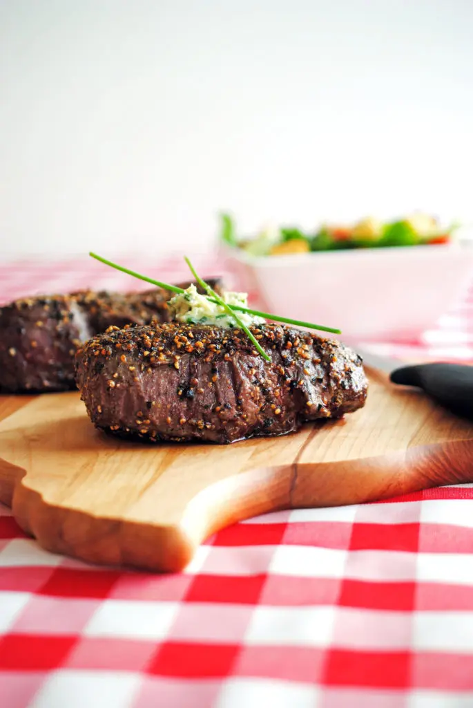 Pepper-Crusted Filet Mignon with Blue Cheese-Chive Butter