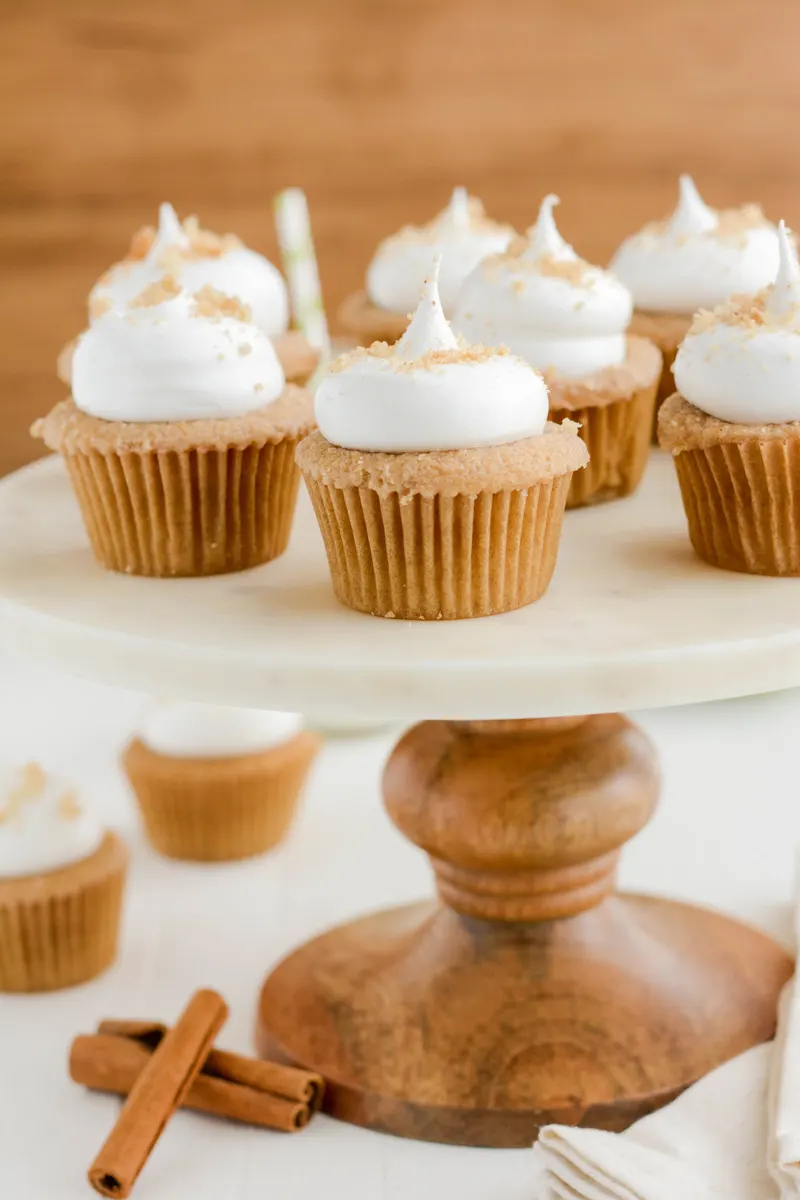 Wide open shot of Snickerdoodle Cupcakes on cake stand.