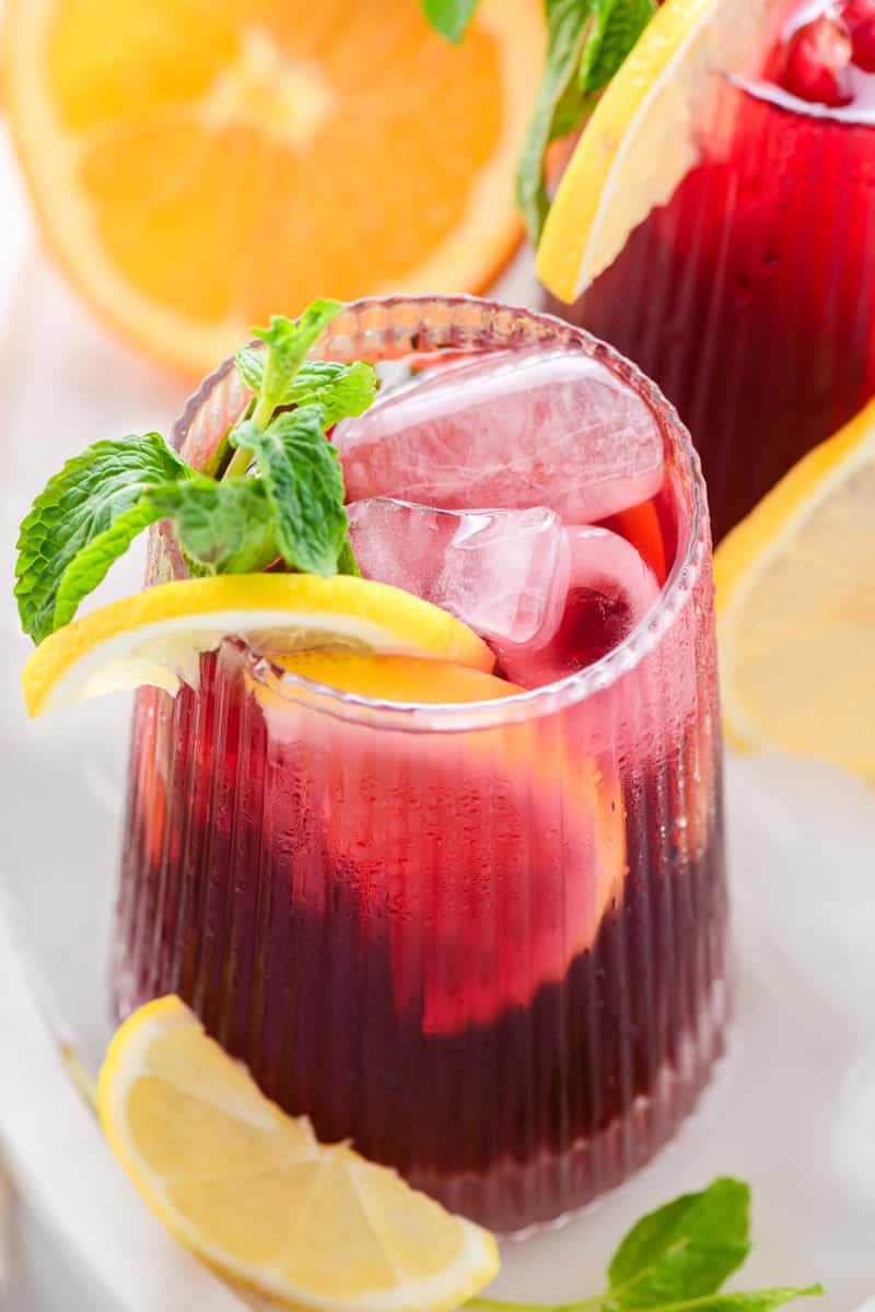 Close up angled shot of one glass of Simple Sangria.