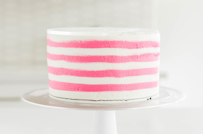 Bubble Gum Layer Cake with stripes smoothed.