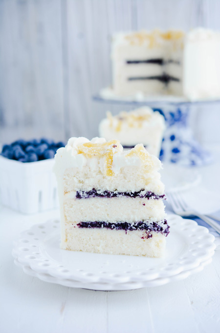 Lemon Blueberry Layer Cake sliced on plate.