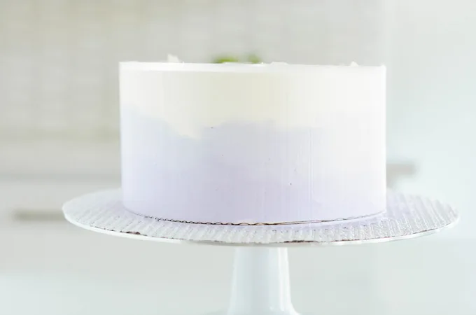 Lavender Lemon Layer Cake smoothed with cake scraper.