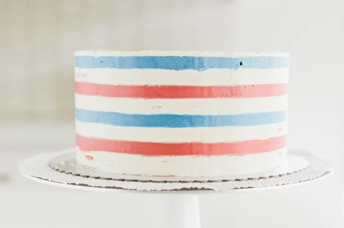 Stars and Stripes Vanilla Cake smoothed with cake scraper.