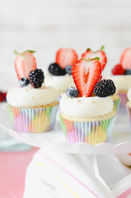 White Cupcakes with Mixed Berry Filling