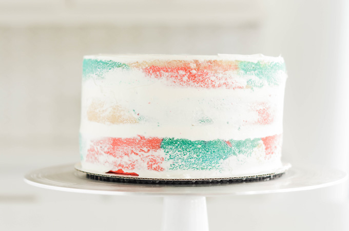 Cotton Candy Layer Cake crumb coated.