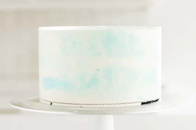Cotton Candy Layer Cake scraped blue buttercream dabs.
