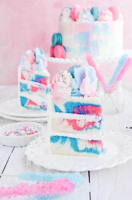 Cotton Candy Layer Cake sliced on plate.