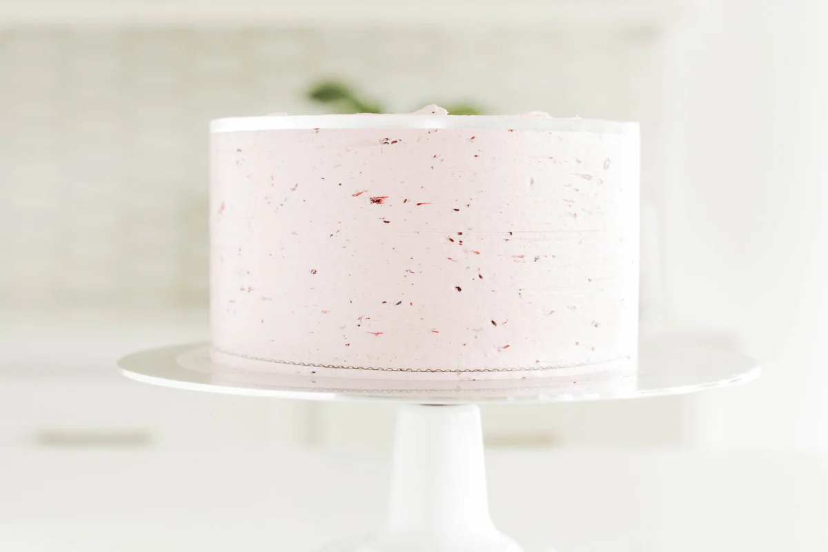 Lime Cake with Blackberry Filling smoothed buttercream.