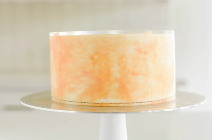 Orange Creamsicle Layer Cake light orange spots smoothed.