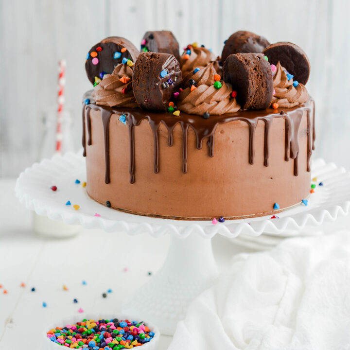 Cosmic Brownie Layer Cake on cake pedestal.