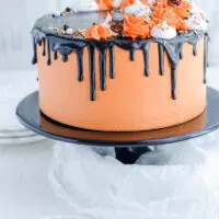 Devil’s Food Halloween Cake on black cake pedestal.