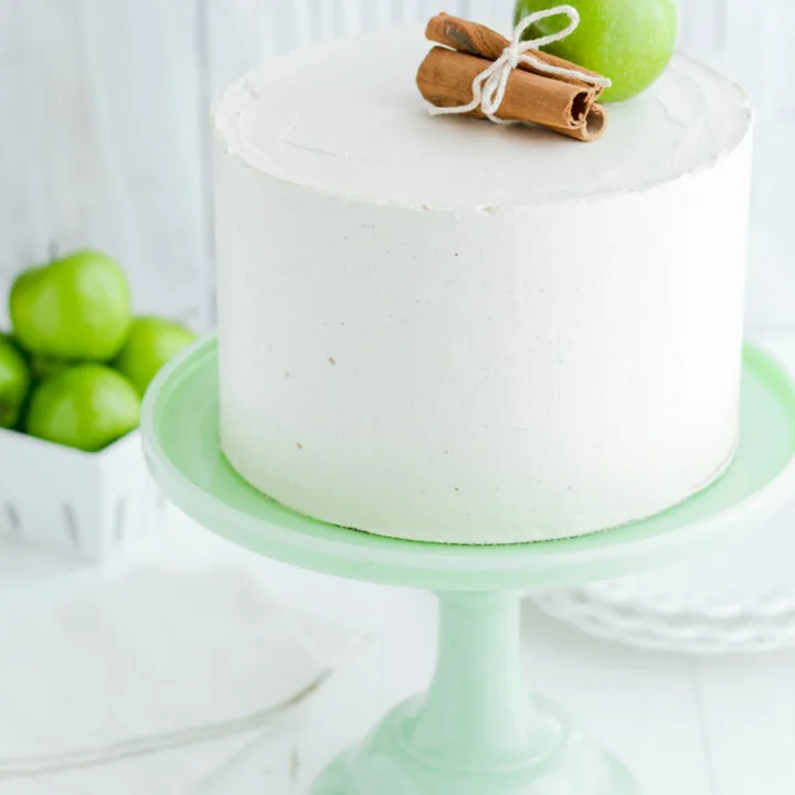 Apple Spice Cake on green cake pedestal.