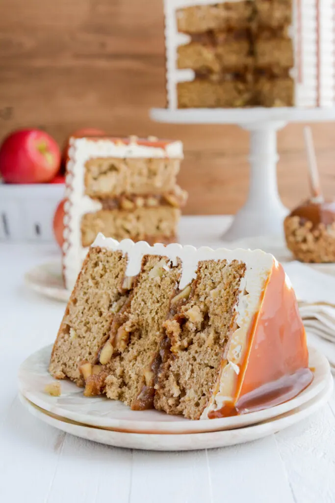 Caramel Apple Layer Cake sliced on its side on a plate.