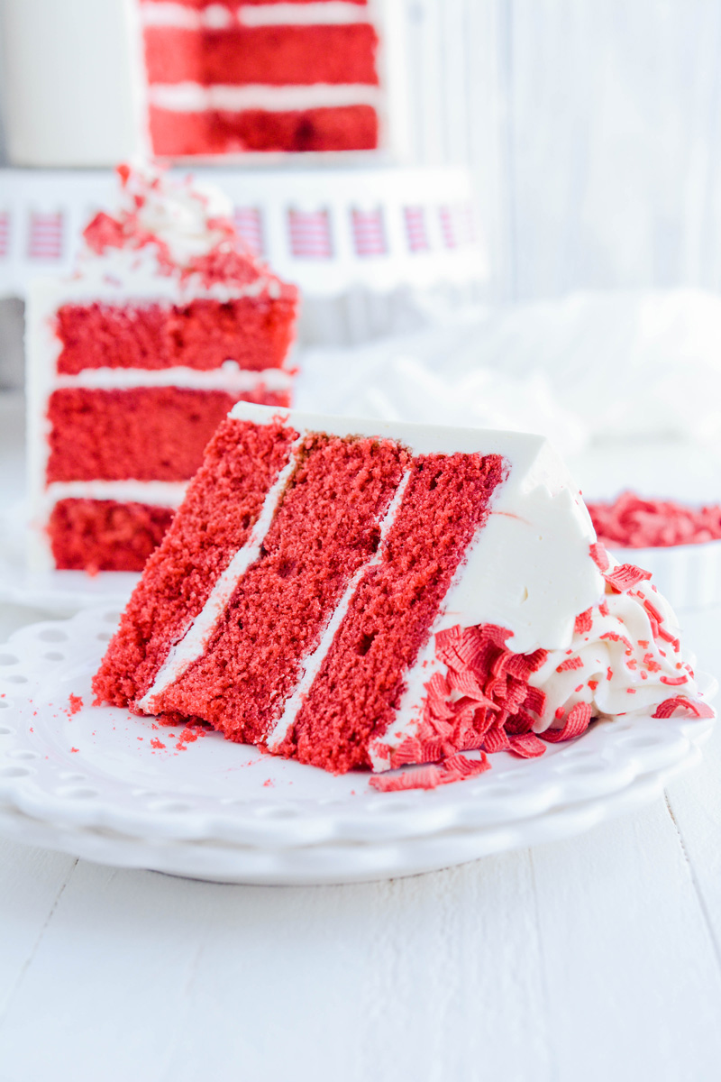 Fluffy Red Velvet Cake slice on its side.