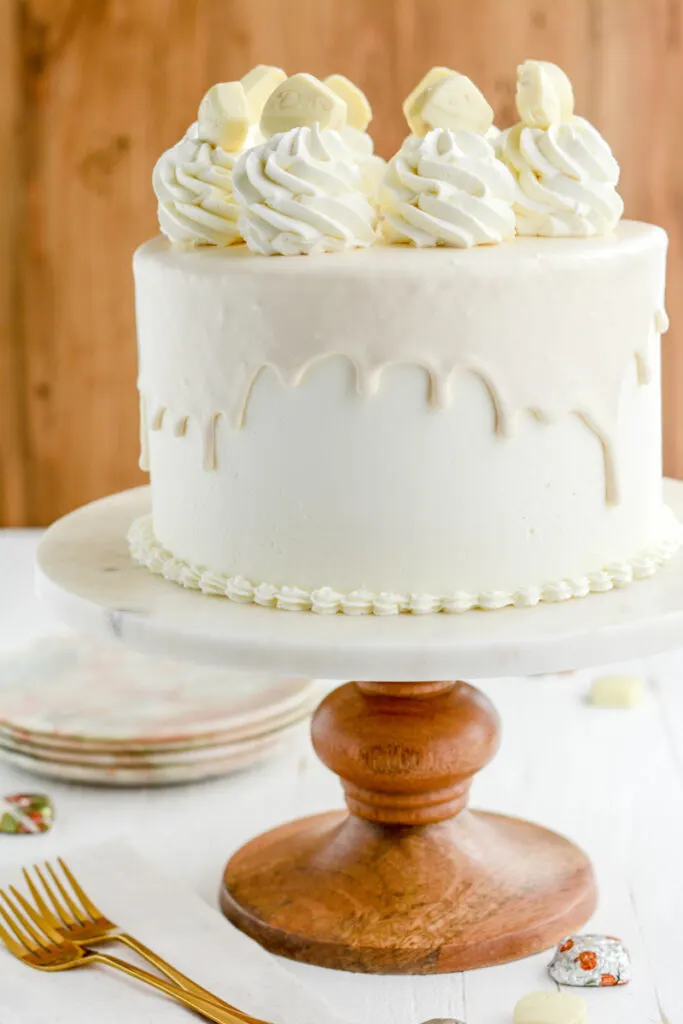 White Chocolate Pumpkin Cake on cake pedestal.