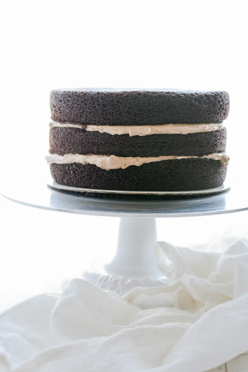 Super Moist Chocolate Cake filled and stacked.