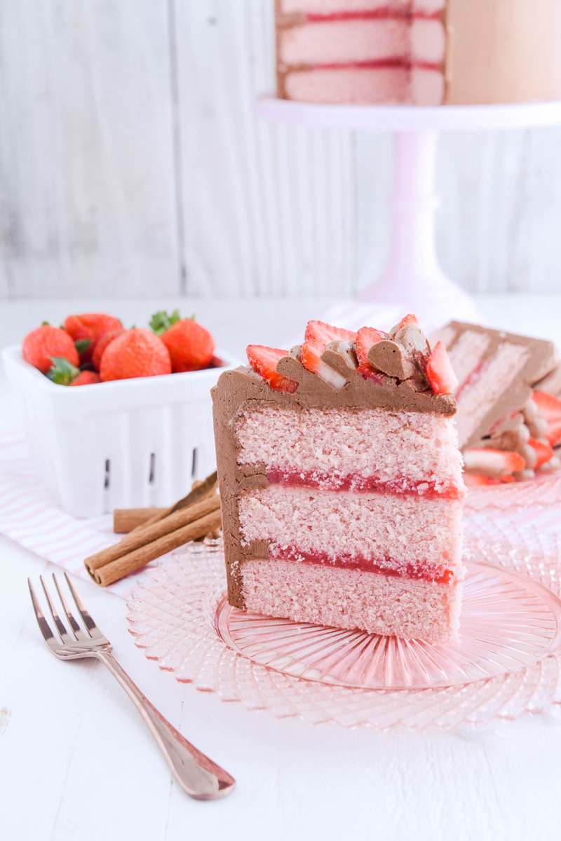 Close up shot of slice of Strawberry Cinnamon Cake.