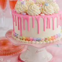 Close up of Valentine's Day Red Velvet Cake on cake pedestal.