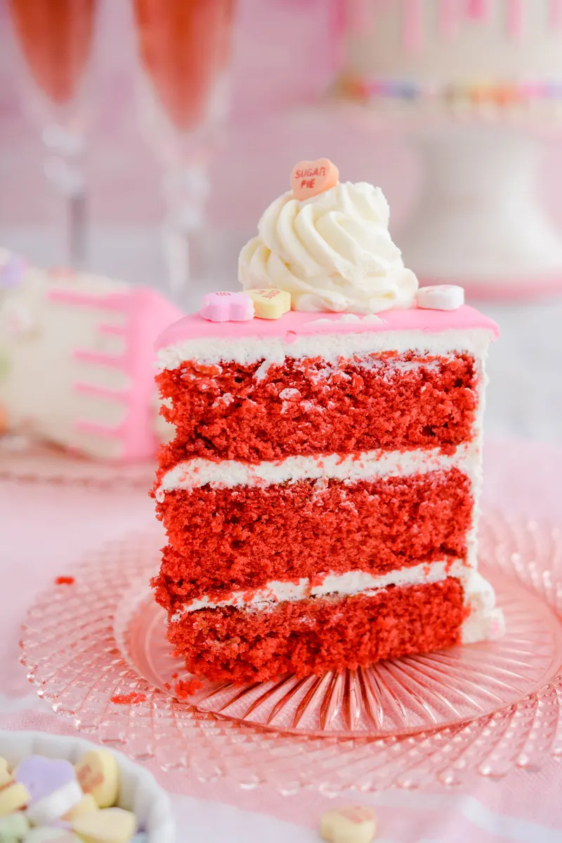Close up of cake slice for Valentine's Day Red Velvet Cake.