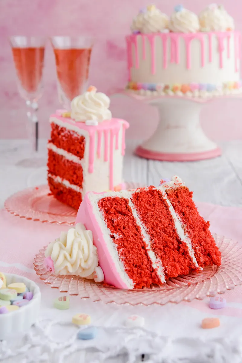 Valentine's Day Red Velvet Cake sliced on its side on a plate.