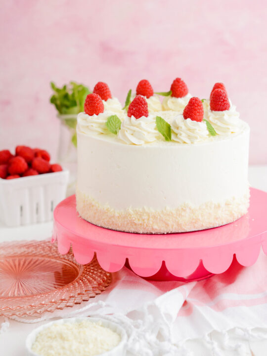 Coconut & Raspberry Cake with White Chocolate Icing - Vegan Recipe Club
