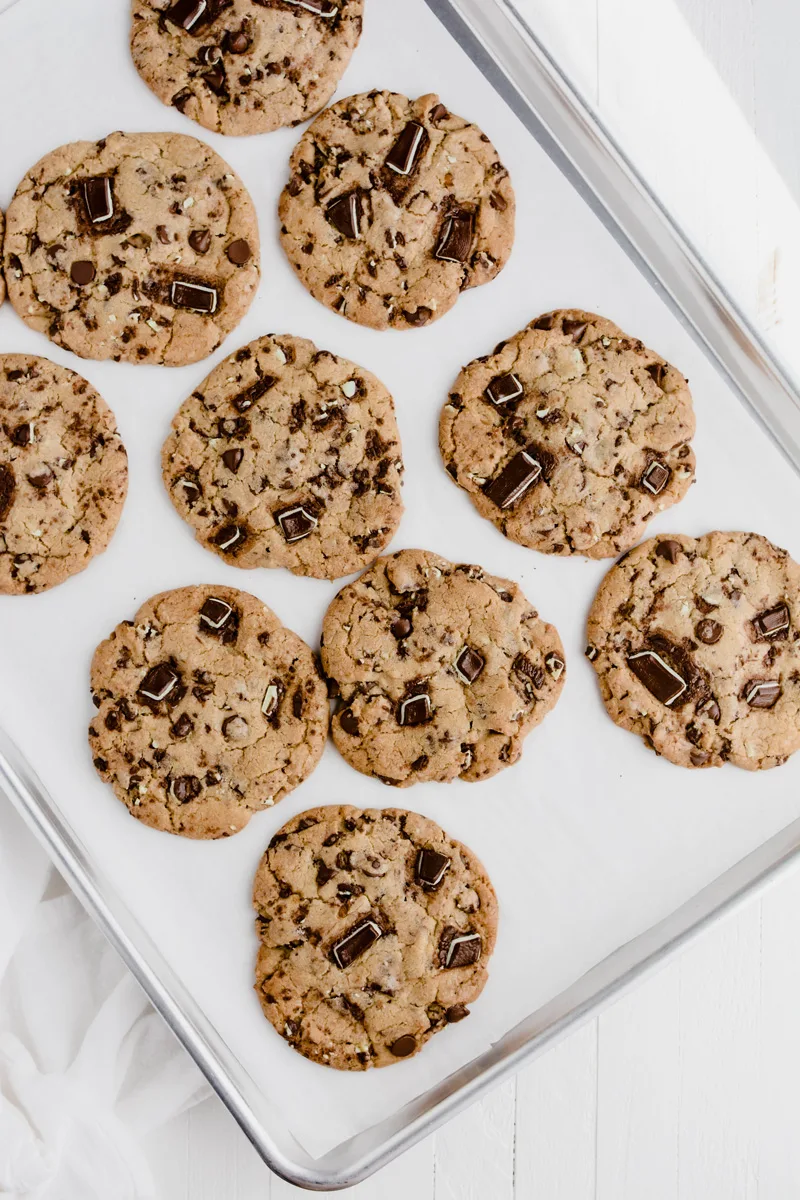 Overhead shot of Andes Mint Chocolate Chip Cookies on baking sheet.