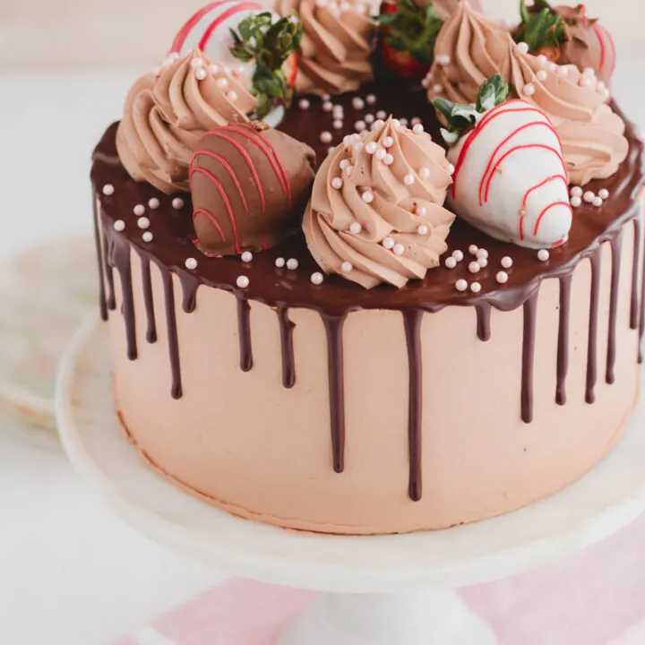 Off center shot of the top of Chocolate Covered Strawberries Cake.