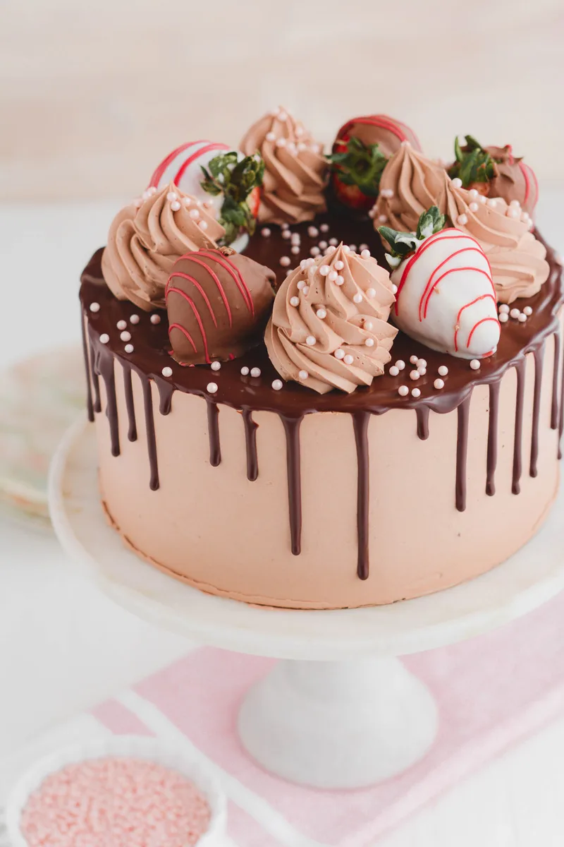 Off center shot of the top of Chocolate Covered Strawberries Cake.