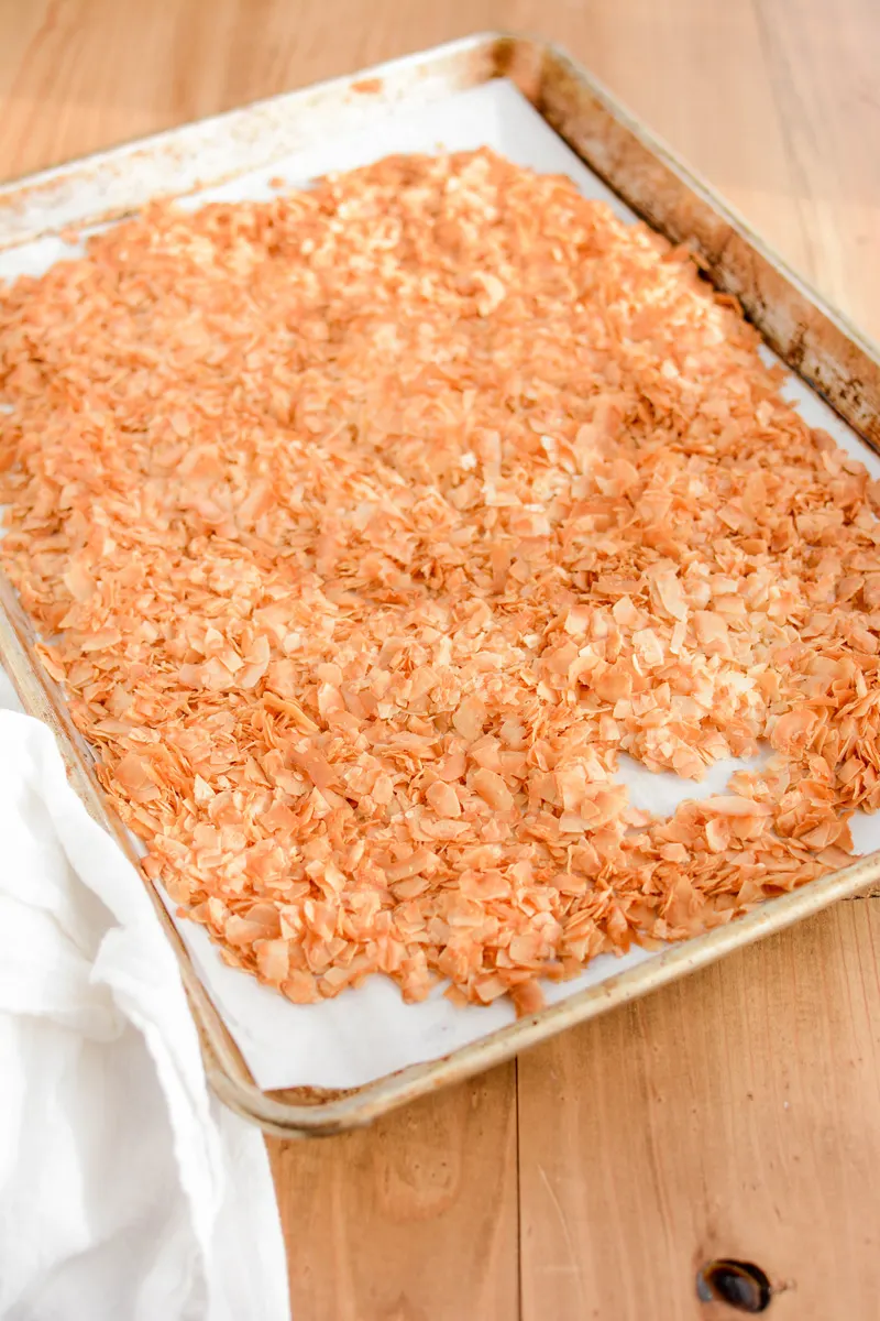 Toasted unsweetened coconut flakes for Toasted Coconut Caramel Layer Cake.