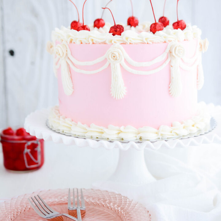 Vintage Cherry Layer Cake on milk glass cake pedestal.