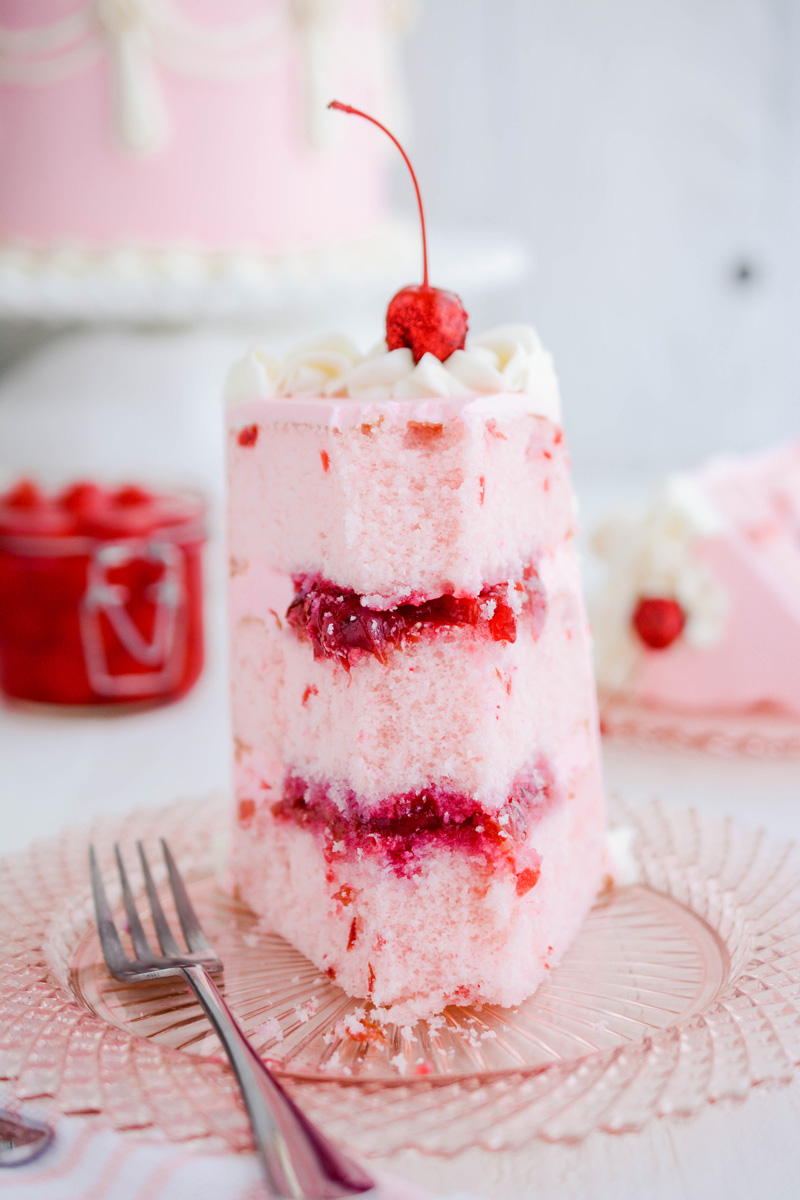 Close up of sliced Vintage Cherry Layer Cake.
