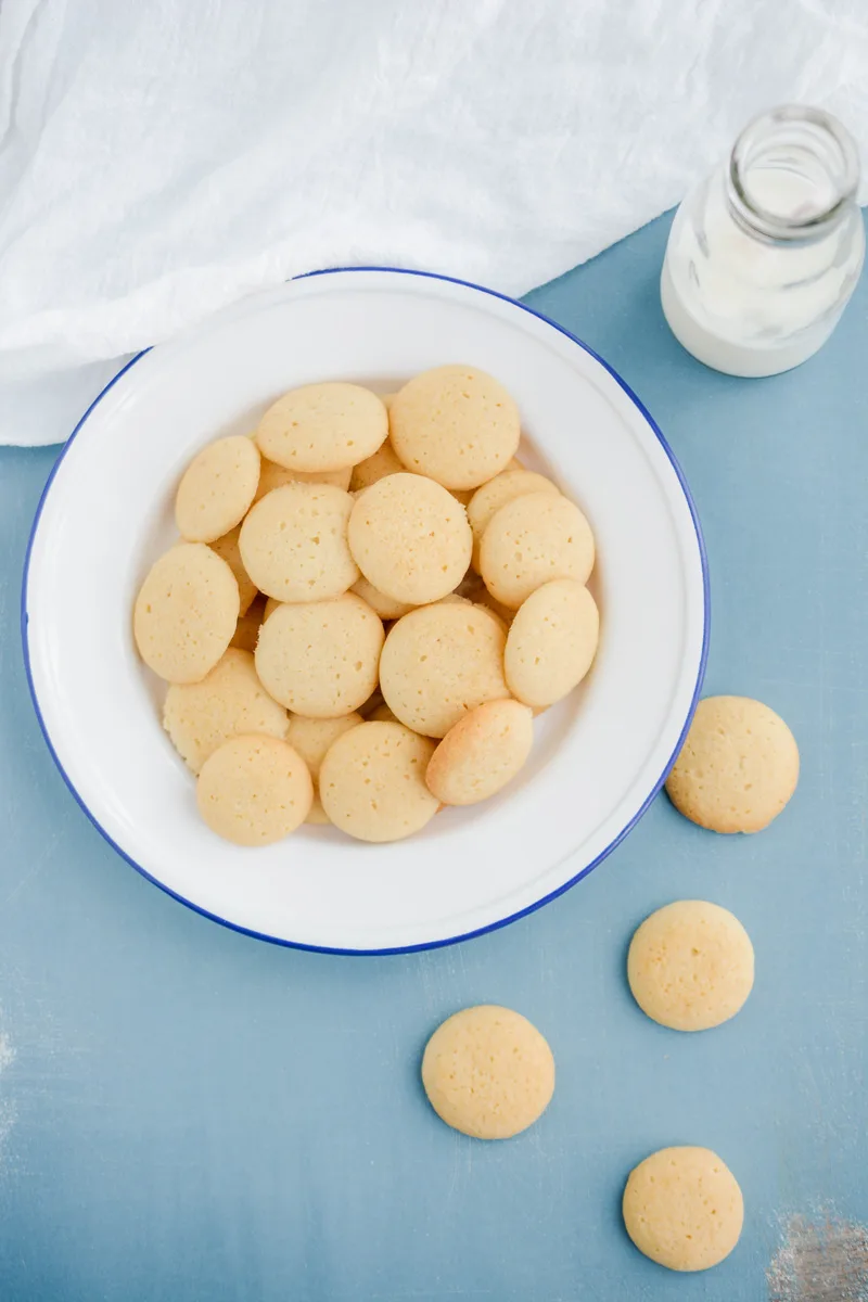 Overhead shot of Homemade Vanilla Wafers on white plate.