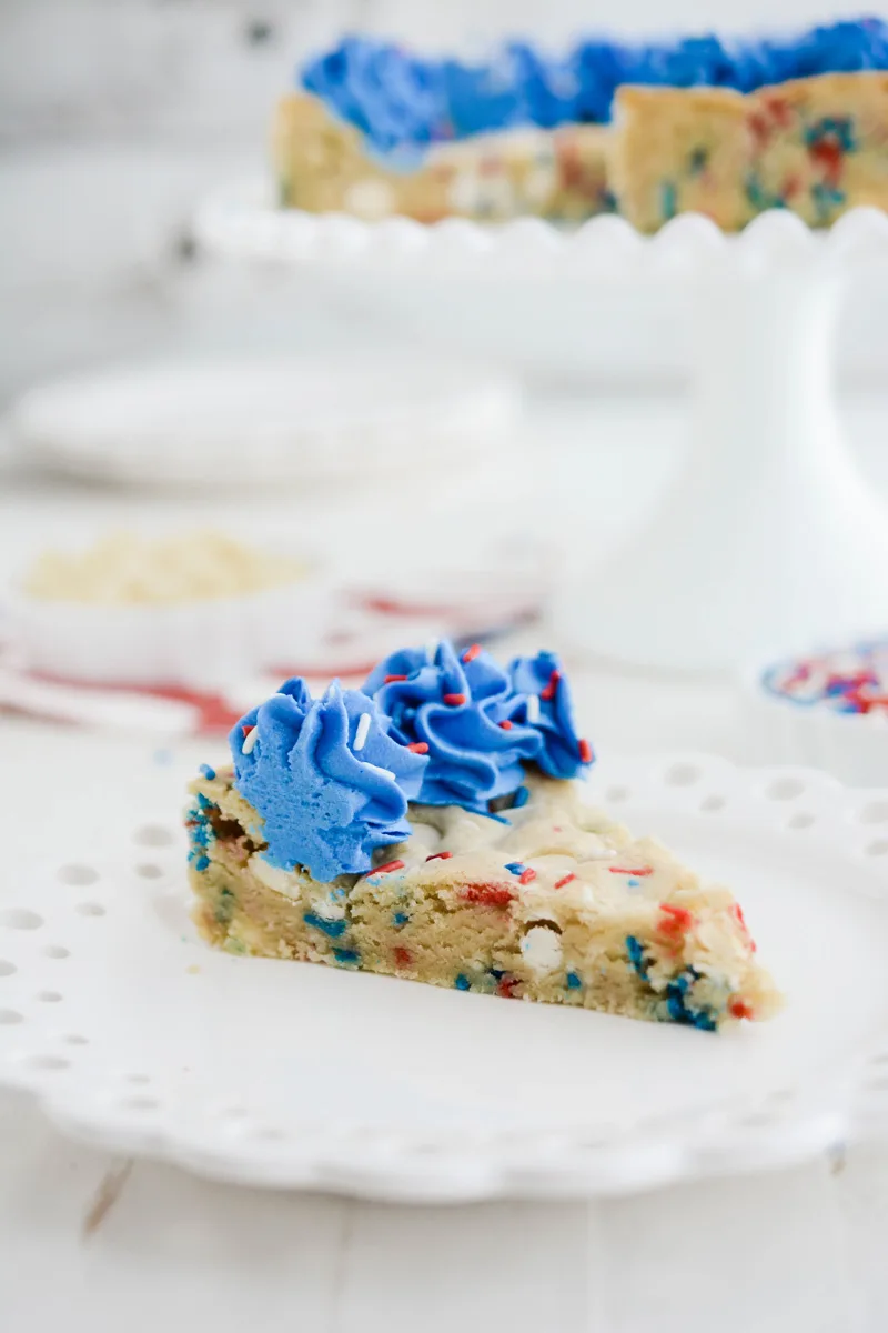 Close up of sliced July 4th Cookie Cake on a plate.