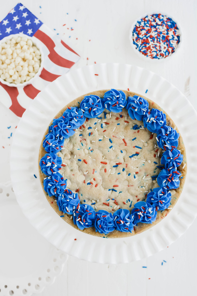 Close up overhead shot of July 4th Cookie Cake on cake pedestal.