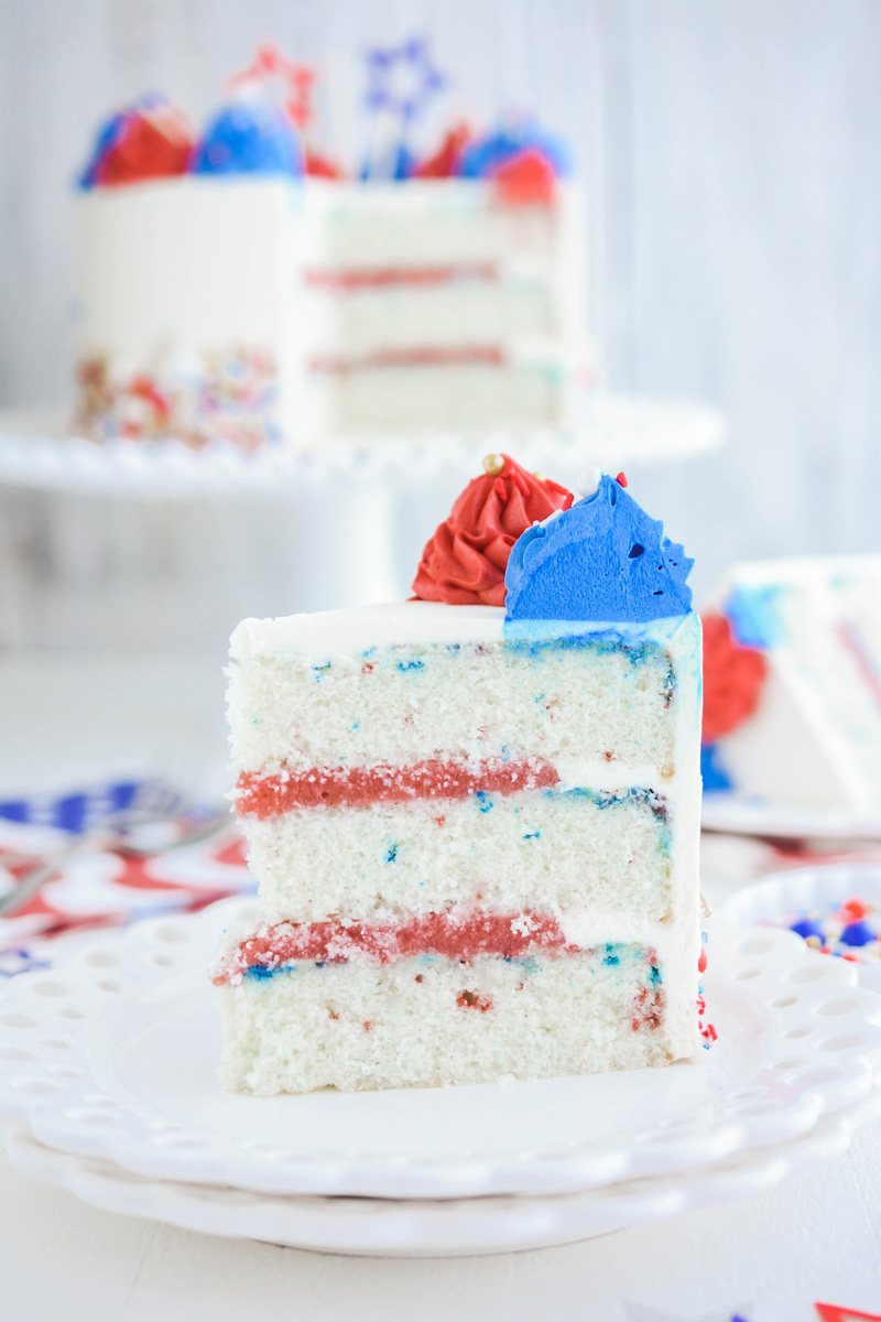 Close up of sliced Patriotic Confetti Cake.