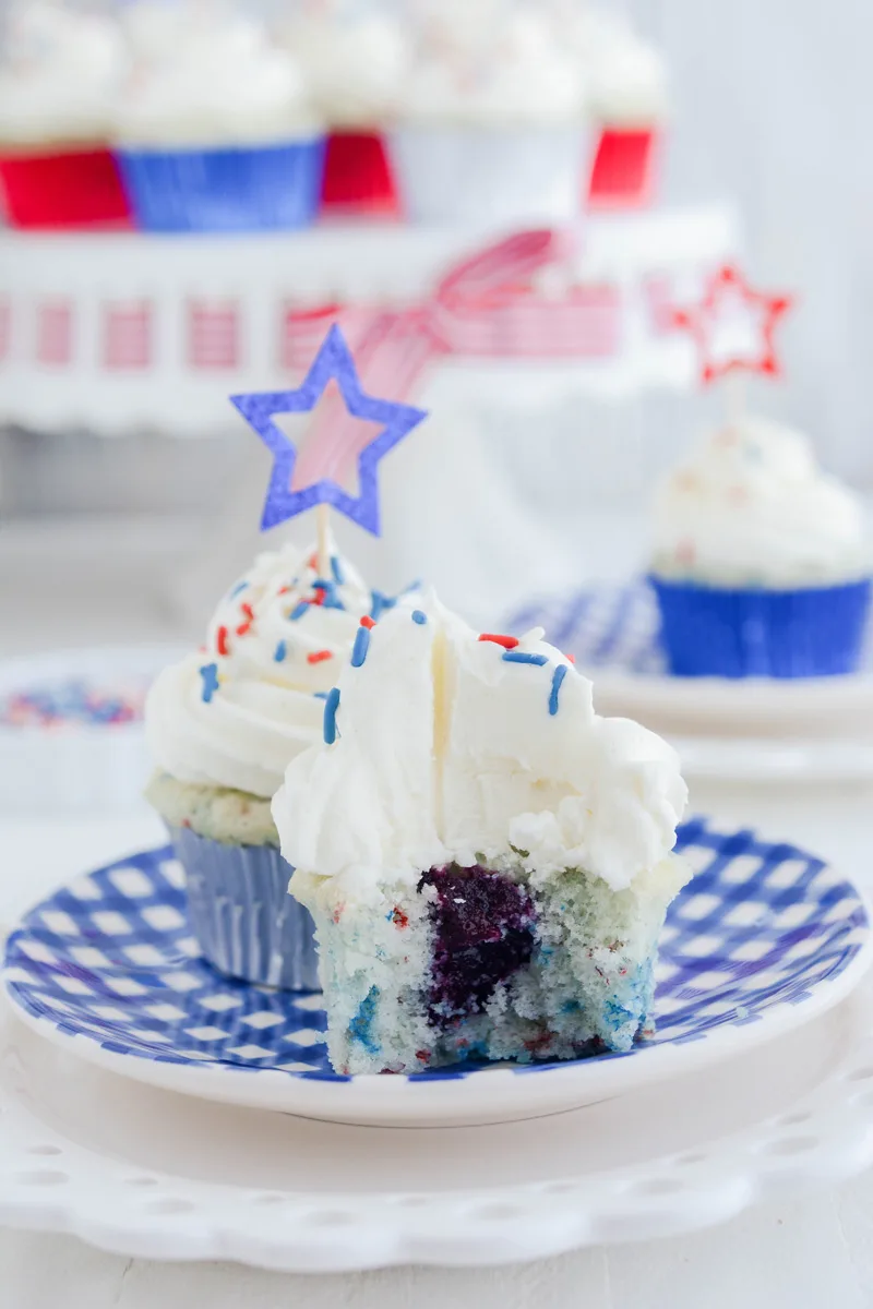 Close up of Patriotic Confetti Cupcakes blueberry filling.