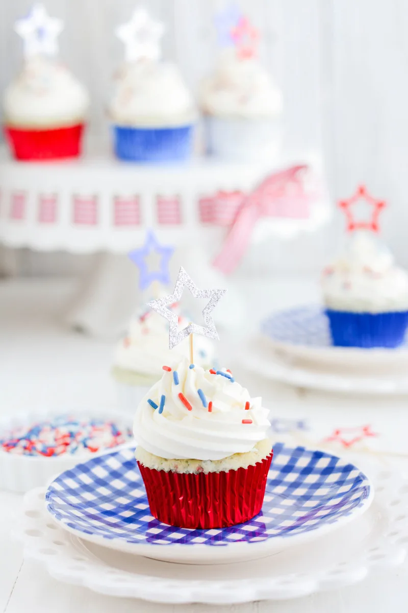 Close up of Patriotic Confetti Cupcakes on a plate.
