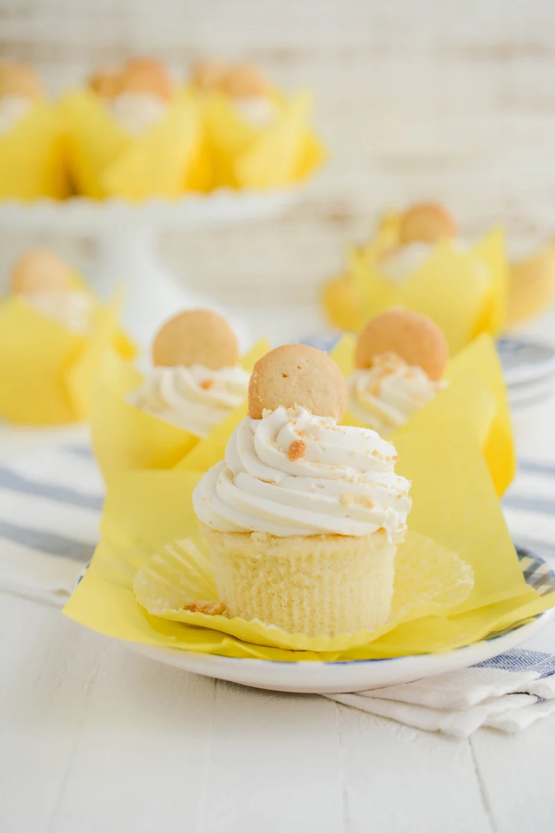 Close up shot of unwrapped Banana Cream Pie Cupcakes.