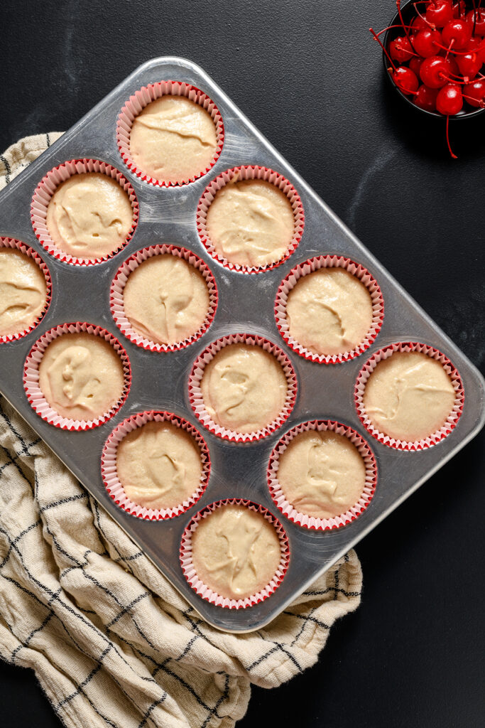 Overhead shot of Root Beer Float Cupcake batter on cupcake pan before baking.