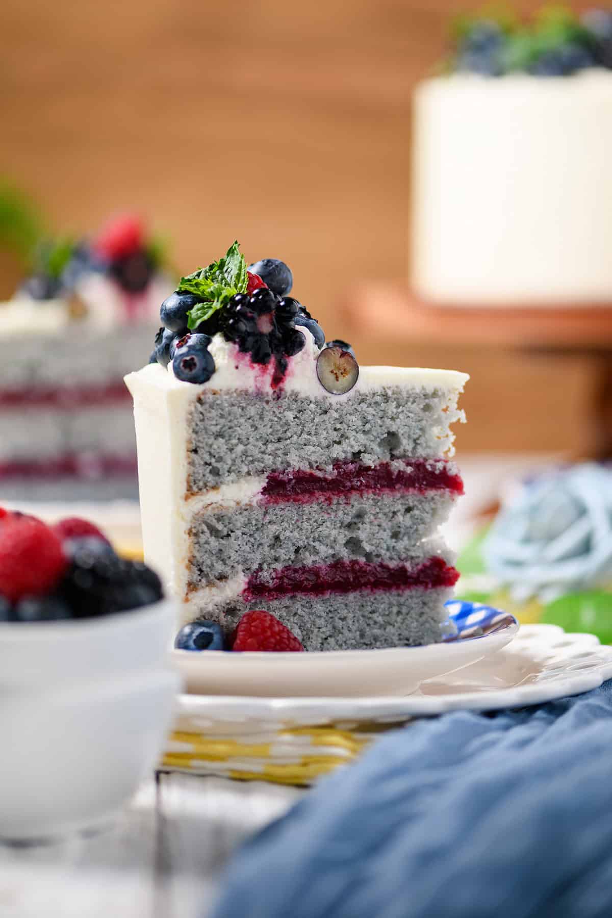 Close up of sliced Mixed Berries and Cream Cake.