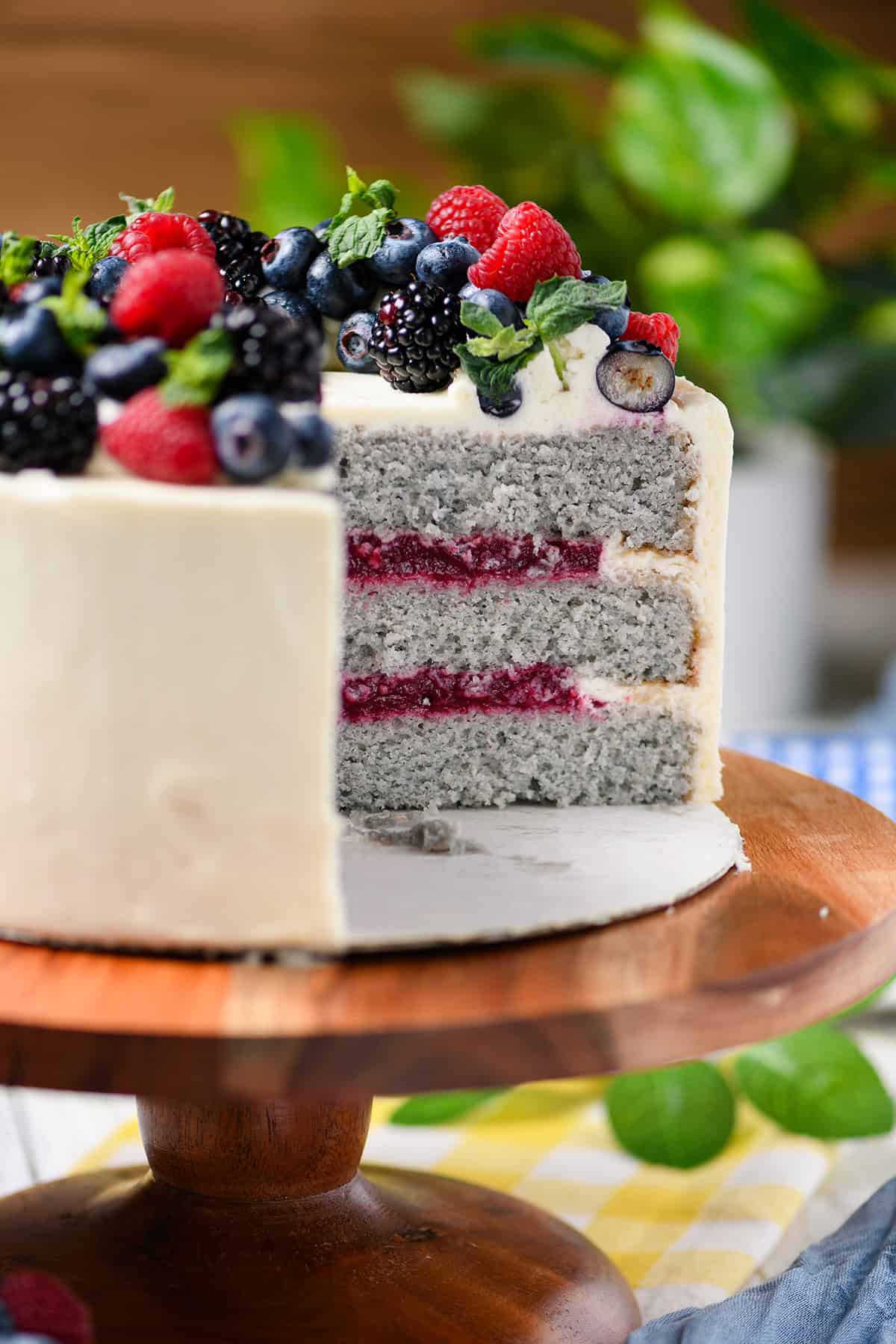 Close up of sliced Mixed Berries and Cream Cake layers.
