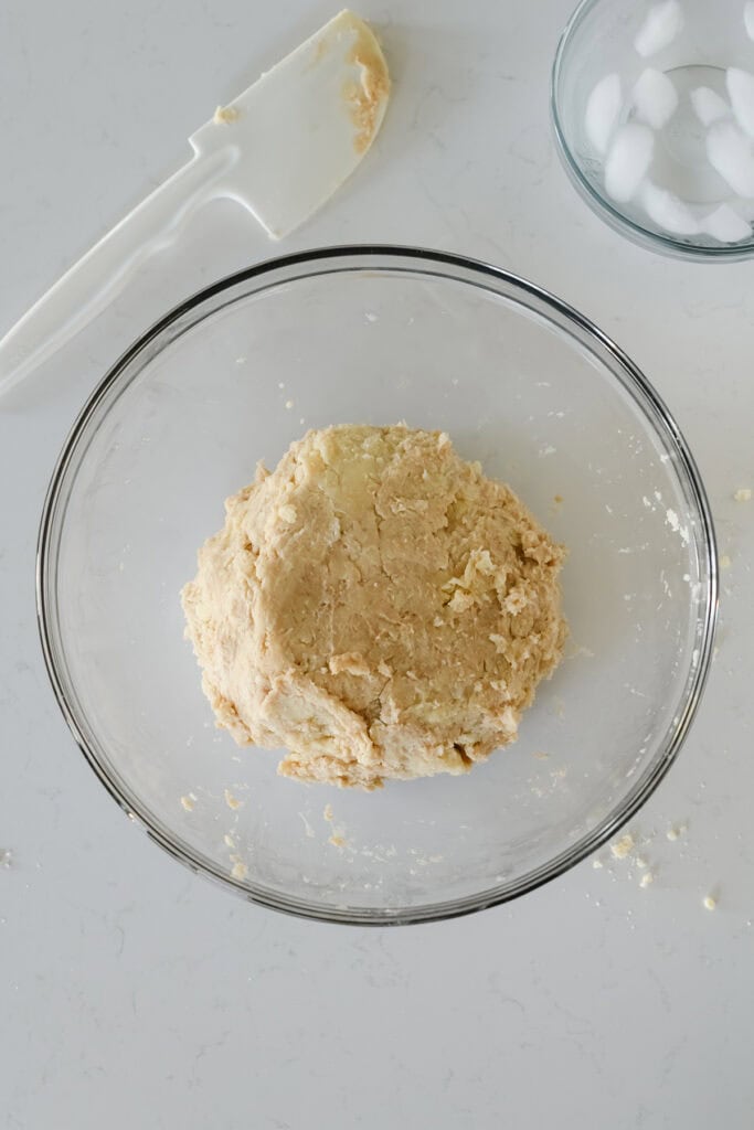 Overhead shot of completed pie dough in glass bowl for Easy Cherry Pie.