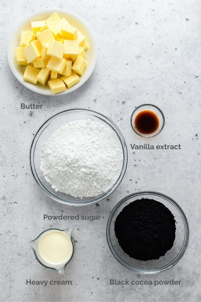 Overhead shot of black buttercream ingredients for Black Velvet Halloween Cupcakes.