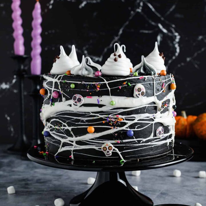 Black Velvet Halloween Cake on black cake pedestal, head on shot.