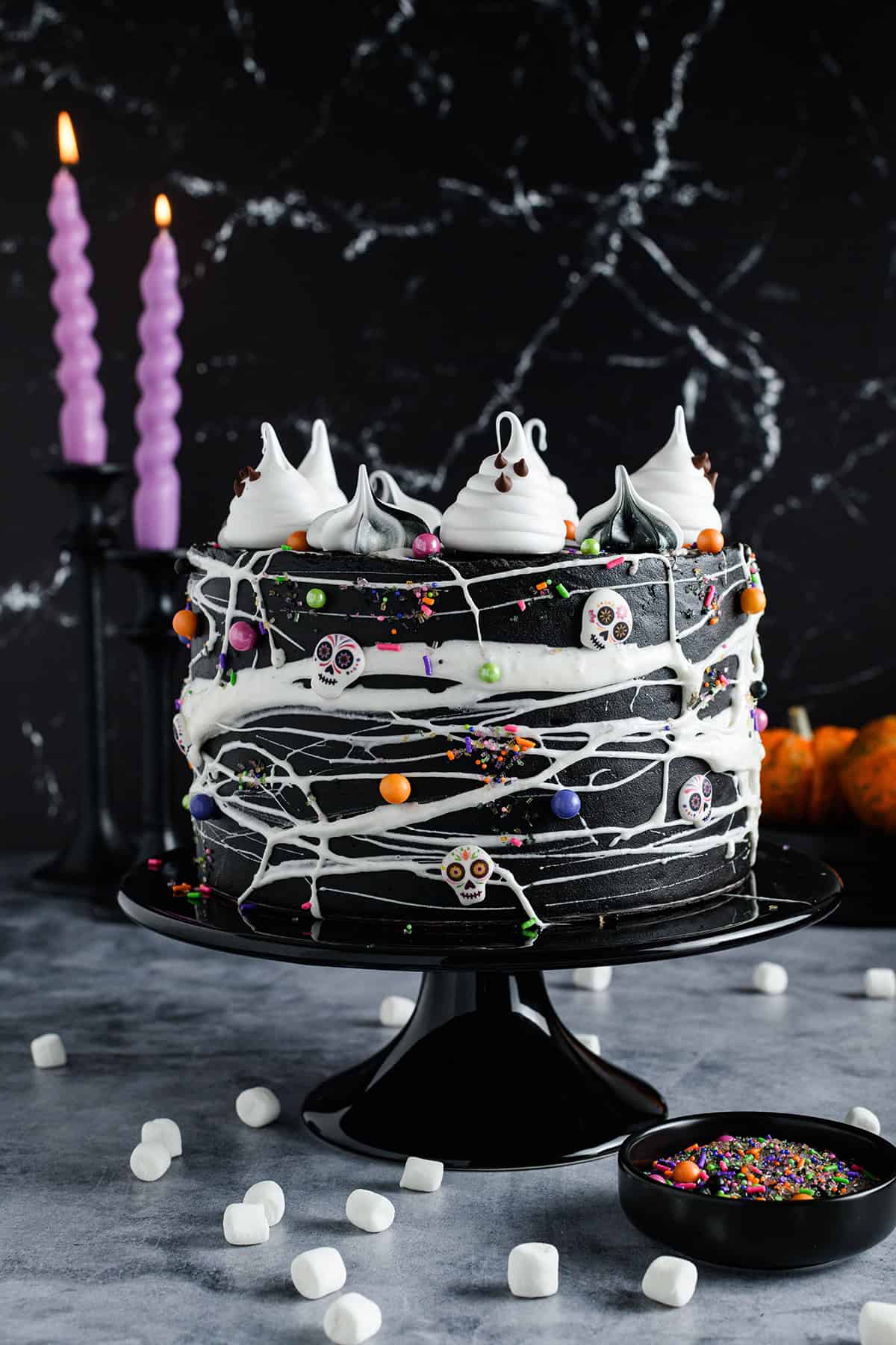 Black Velvet Halloween Cake on black cake pedestal, head on shot.