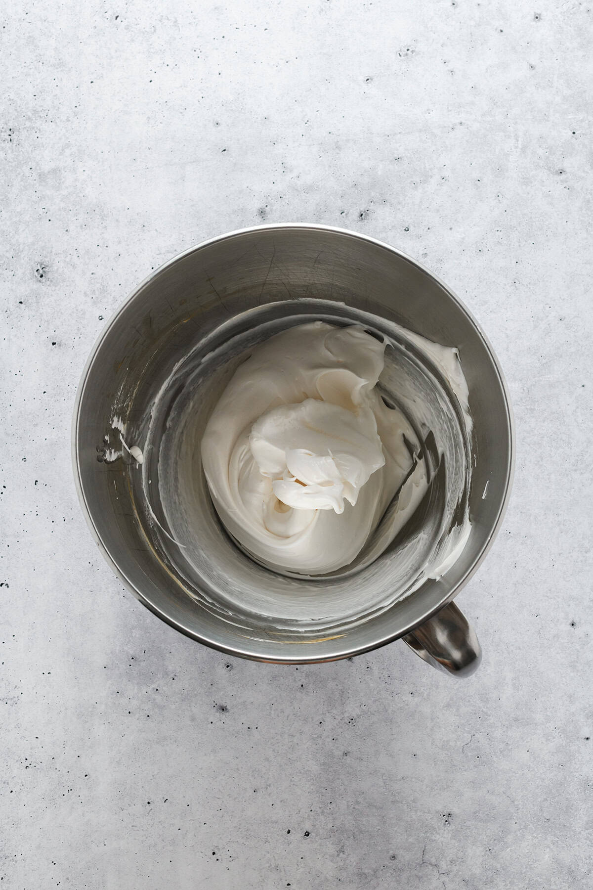 Overhead shot of completed marshmallow filling for Black Velvet Halloween Cupcakes.