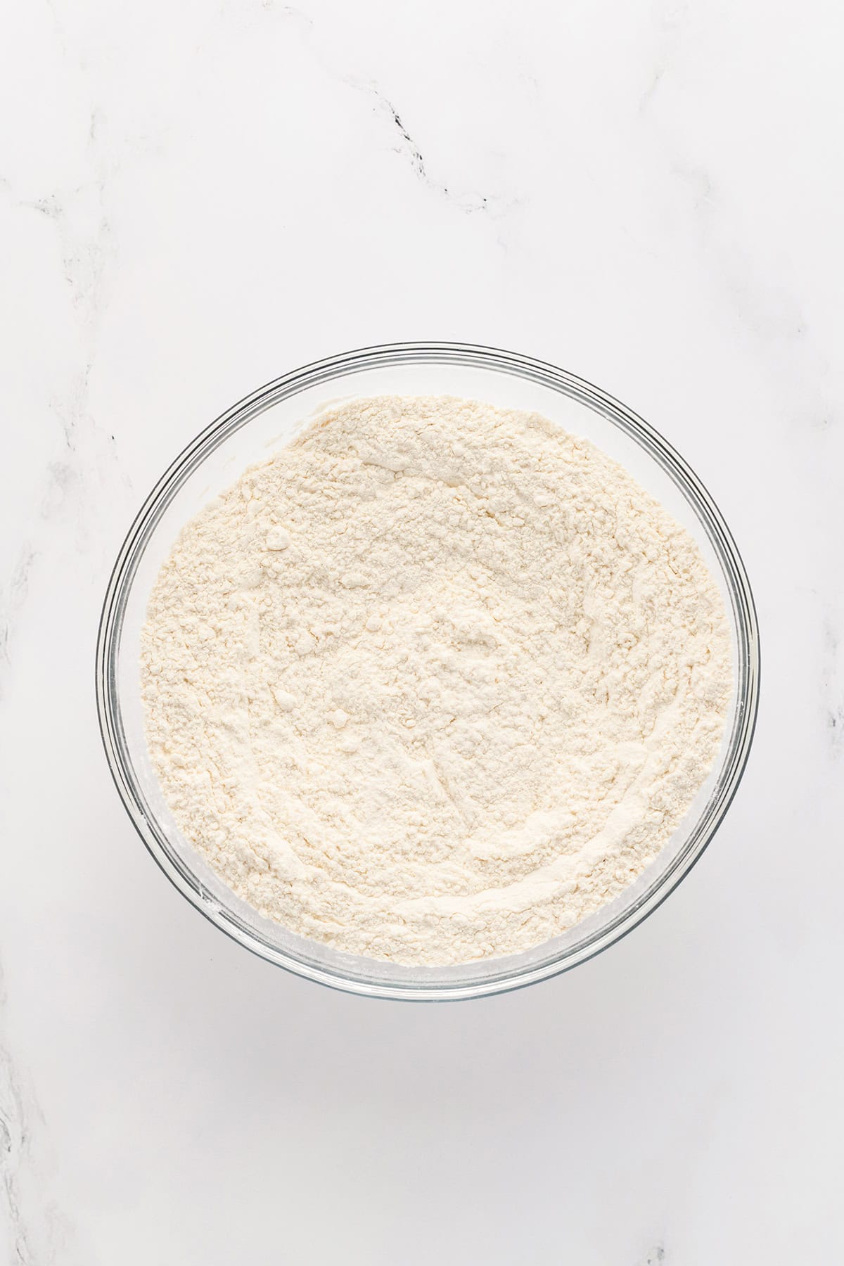 Overhead shot of dry ingredients for Mexican Sprinkle Cookies.